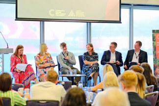 A group of panelists at the conference