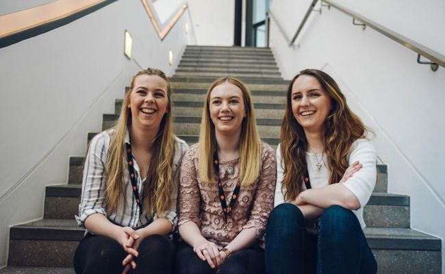 Women sittng on stairs