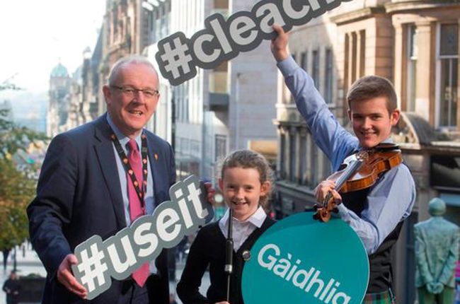 Image of the Commissioner standing on a street in Edinbourgh
