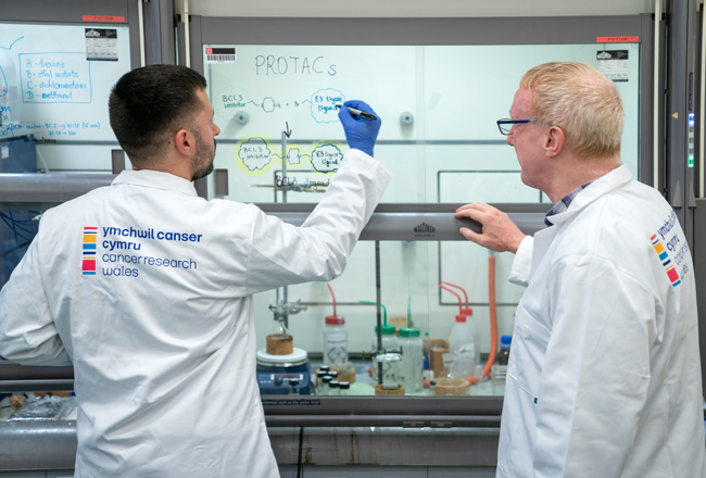 Researches working in a lab